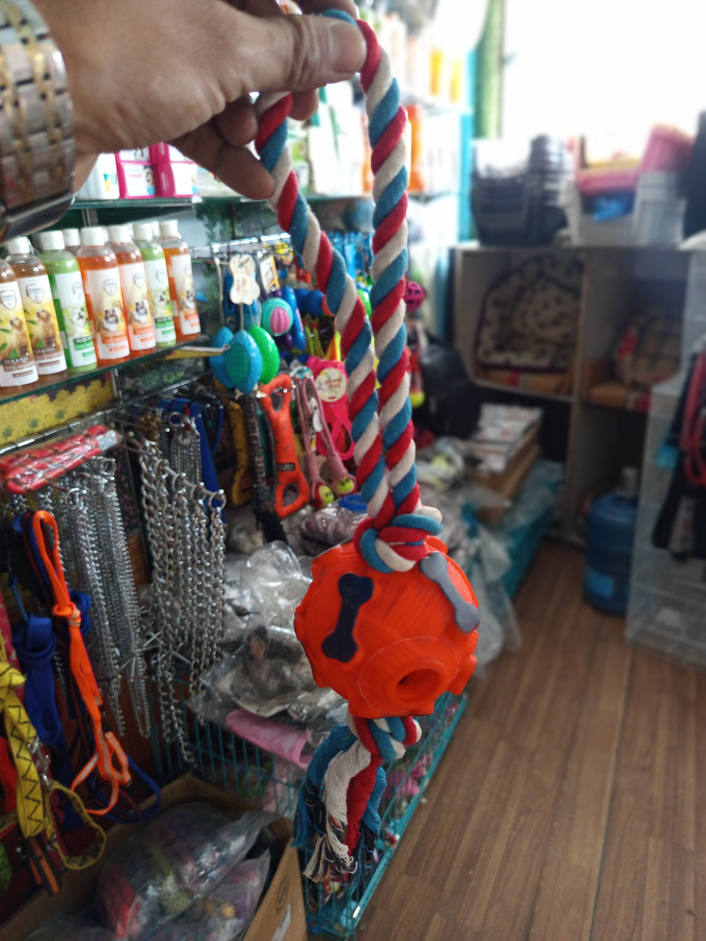 Plastic ball with rope